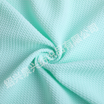 厂家直销新款针织斜泡泡布  子弹头提花布 全涤泡泡布